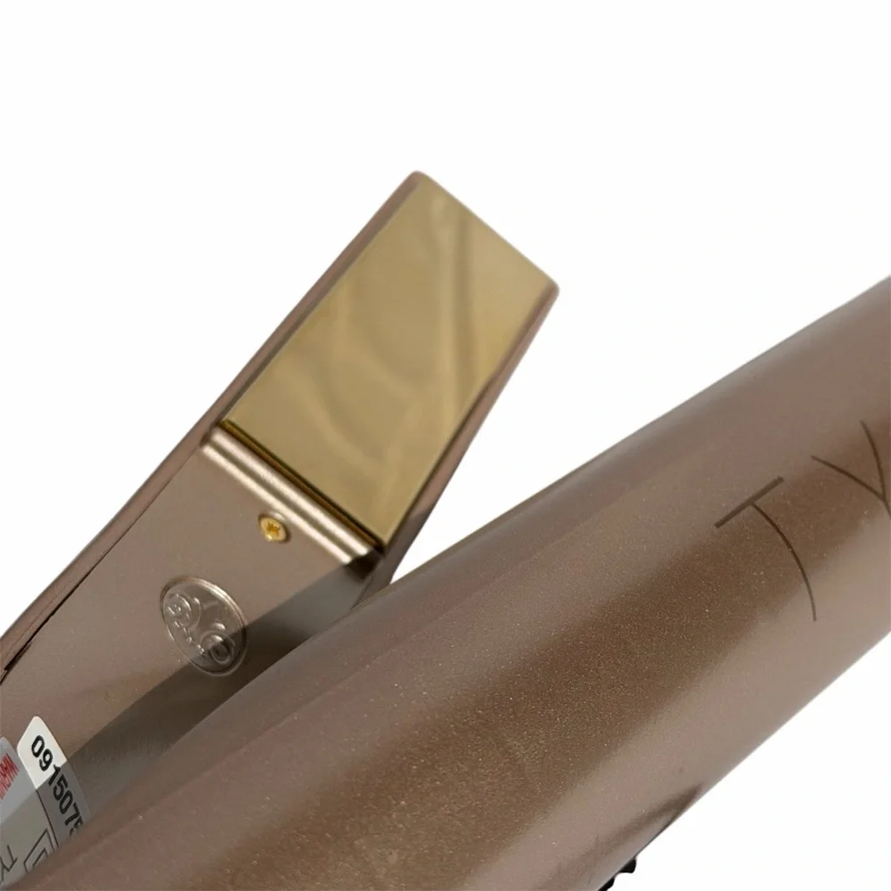 Tyme Original straightening and curling Iron in metallic gold with heat sleeve